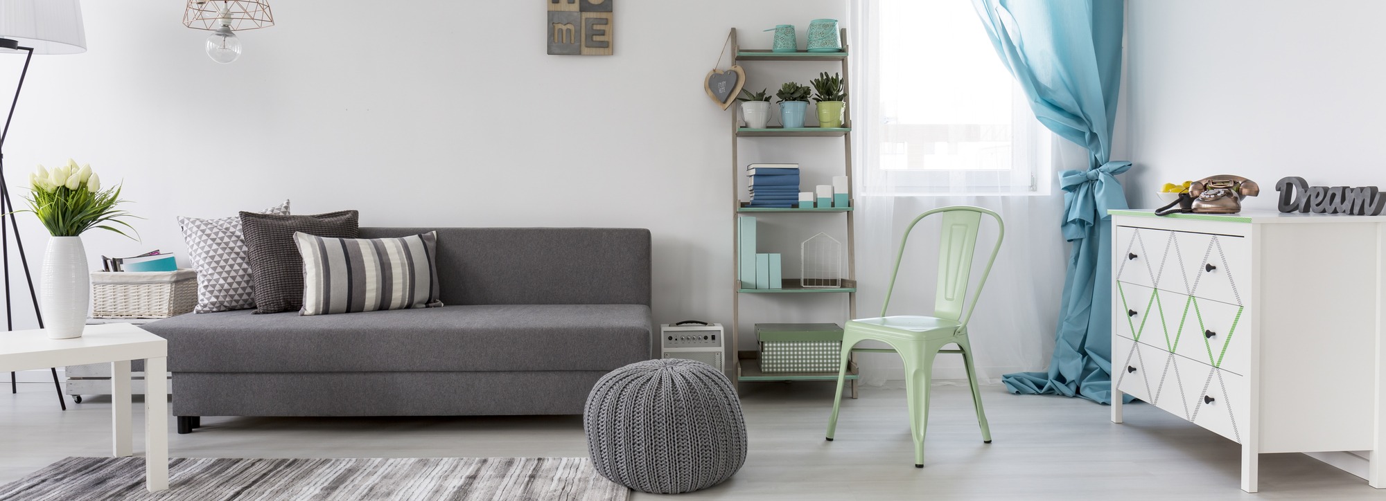 New Living Room In Scandinavian Style With Grey Sofa and White Commode, Panorama